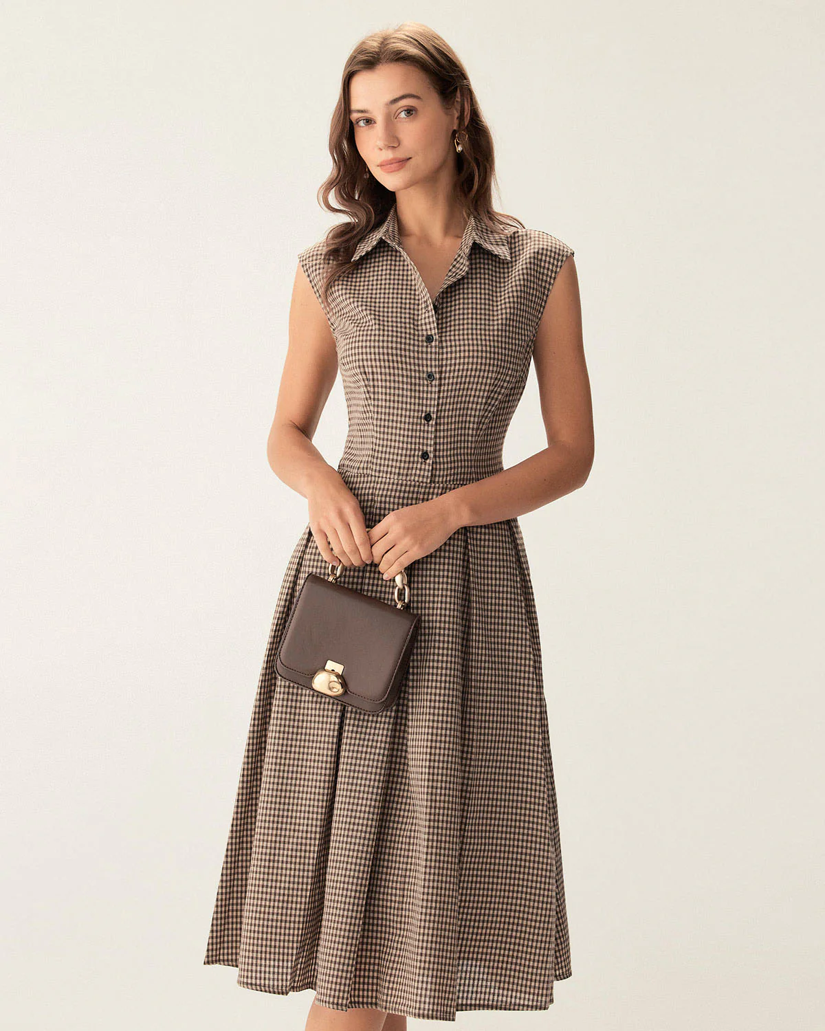 4e0bce19f4cca65482afabb845685535cabe5d0ef1fab45719d23ea4ea544b0a.webp Brown Plaid Button Pleated Midi Dress - Image 1