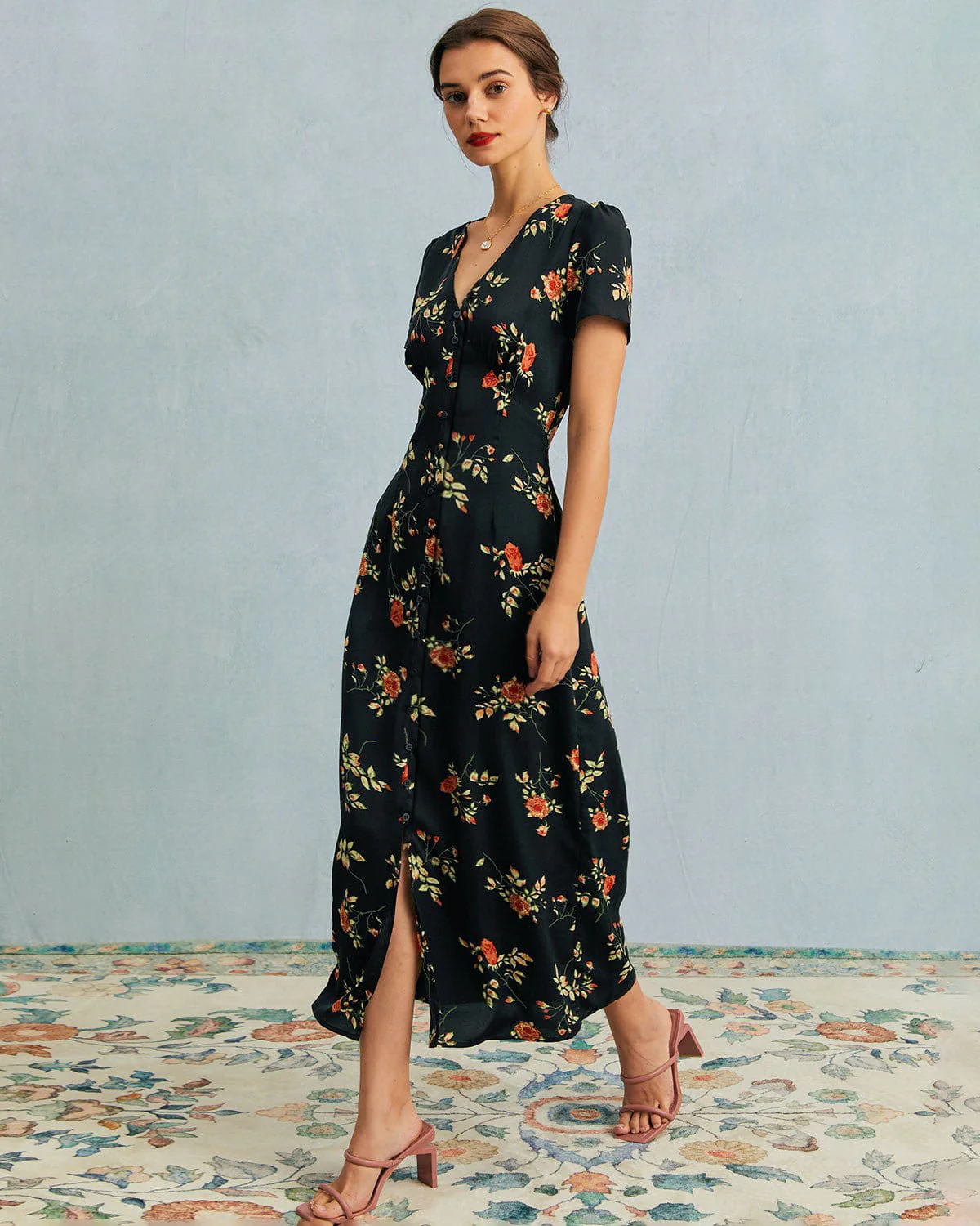 d401f71e8d1f4ba1fd88245dd28fc836ca38b488ee0e7bb988386ba92399f4d5.webp The Black V Neck Floral Short Sleeve Maxi Dress - Image 1
